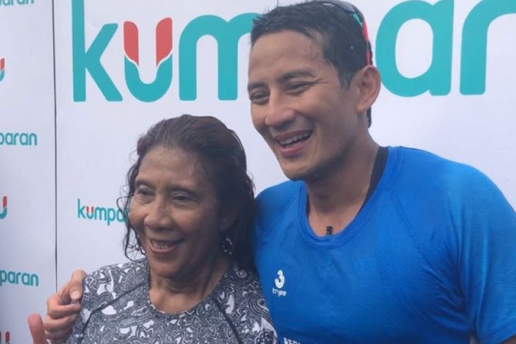 Wakil Gubernur DKI Jakarta Sandiaga Uno dan Menteri Kelautan dan Perikanan Susi Pudjiastuti usai bertanding dalam Tidung Aquathlon, Sabru (5/5/2018).