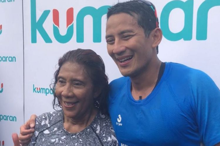 Wakil Gubernur DKI Jakarta Sandiaga Uno dan Menteri Kelautan dan Perikanan Susi Pudjiastuti usai bertanding dalam Tidung Aquathlon, Sabru (5/5/2018). 