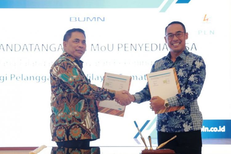 General Manager PLN Wilayah Sumut Feby Joko Priharto dan Direktur UMKM Bank Bukopin Heri Purwanto menandatangani MoU Flexy Bill, Rabu (28/3/2018)