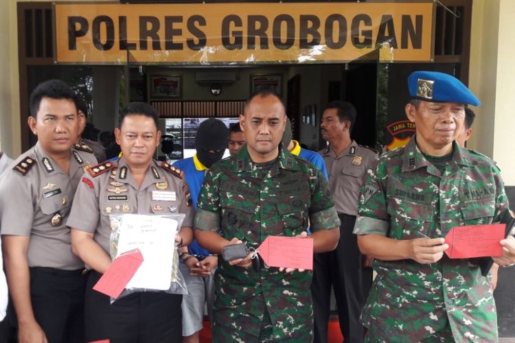 Suasana gelar perkara kasus pengeroyokan yang menewaskan seorang peternak ayam di Mapolres Grobogan, Jawa Tengah, Senin (22/1/2018).?