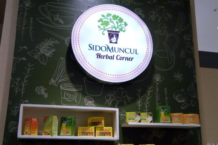 
Logo Sido Muncul Herbal Corner Mal Aeon Bumi Serpong Damai (BSD), Tangerang Selatan. Menurut Direktur Marketing PT Sido Muncul Tbk Irwan Hidayat, pihak Mal Aeon yang kali pertama menginginkan adanya gerai minuman herbal di dalam mal tersebut. Mal Aeon di bawah AEON Group berbasis di Jepang. 