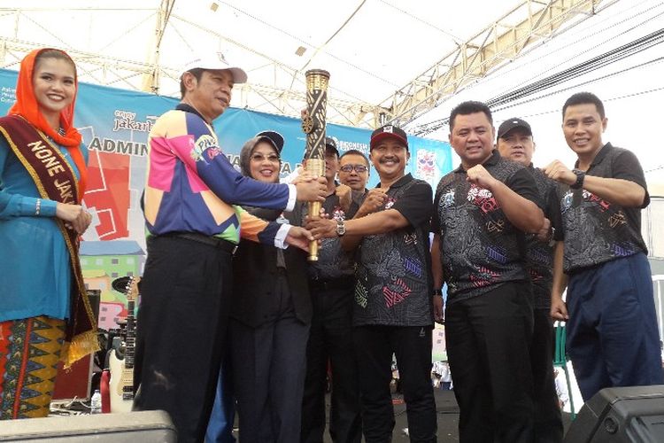 Kampung Tomang RW 02, Grogol Petamburan sukses menjadi tuan rumah kirab obor Asian Para Games 2018 di Jakarta Barat setelah memenangkan Kampung Branding pada Selasa (2/10/2018).