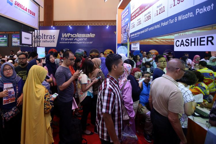 Suasana Garuda Indonesia Travel Fair 2017 di Jakarta Convention Center, Jumat (22/9/2017). Acara yang berlangsung hingga 24 September mendatang memberikan berbagai promo tiket, hotel, dan wisata. 