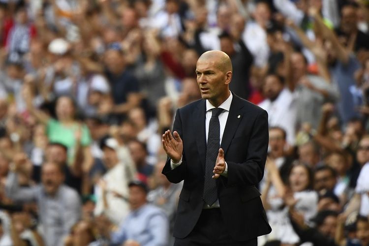 Zinedine Zidane merayakan gol timnya pada pertandingan Real Madrid vs Celta Vigo dalam lanjutan La Liga Spanyol di Stadion Santiago Bernabeu, 16 Maret 2019.