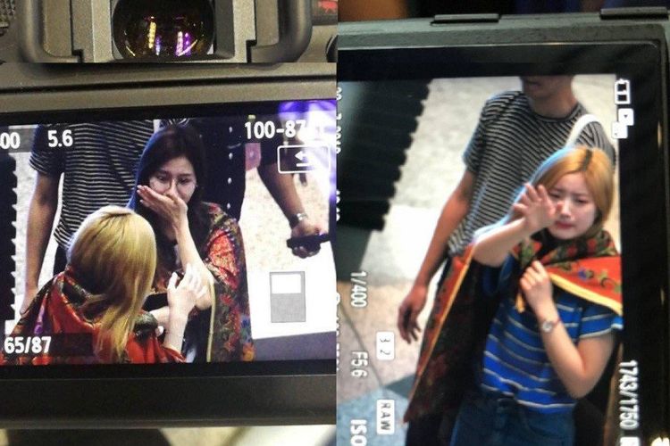 Para member girl group K-pop, TWICE, terlihat menangis di bandara Malaysia, Sabtu (28/7/2018). Hanya sehari sebelum digelar, konser mereka di Kuala Lumpur tiba-tiba dibatalkan.