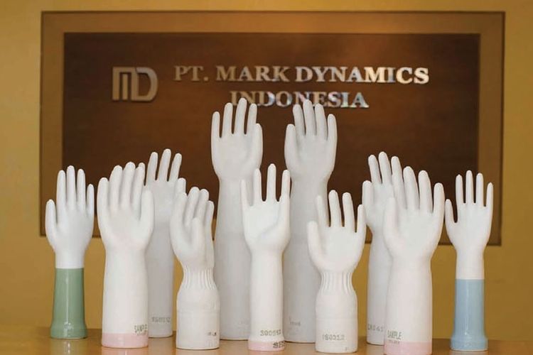 Cetakan sarung tangan produksi PT Mark Dynamics Indonesia Tbk (MARK)