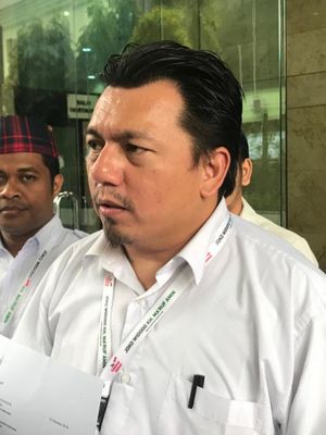 Direktur Hukum dan Advokasi Tim Kampanye Nasional (TKN) Joko Widodo-Maruf Amin, Ade Irfan Pulungan, di Kantor Bareskrim Polri, Gambir, Jakarta Pusat, Kamis (8/11/2018).  