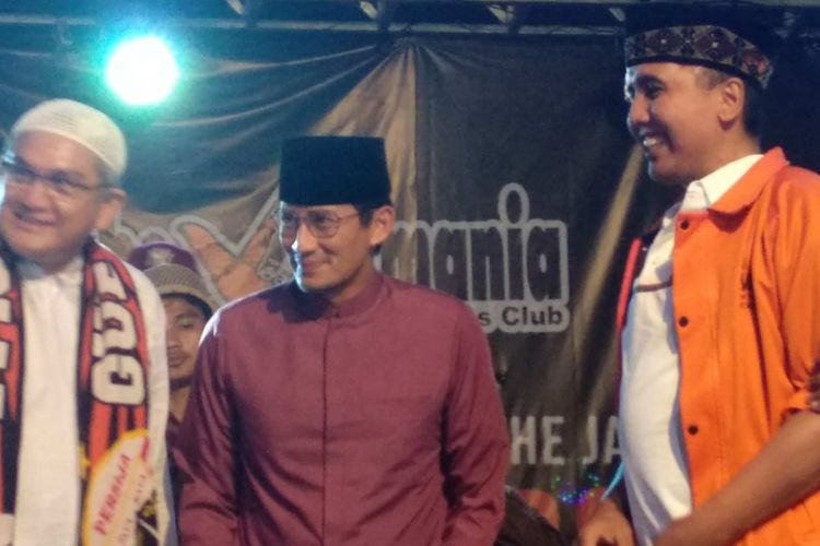 Wakil Gubernur DKI Jakarta Sandiaga Uno menghadiri perayaan hari ulang tahun Jakmania yang ke-20 di Monas, Sabtu (23/12/2017). 
