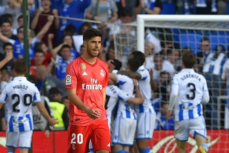 Marco Asensio tampak kecewa seusai gawangnya dijebol lawan pada laga Real Sociedad vs Real Madrid di Stadion Anoeta dalam lanjutan Liga Spanyol, 12 Mei 2019. 