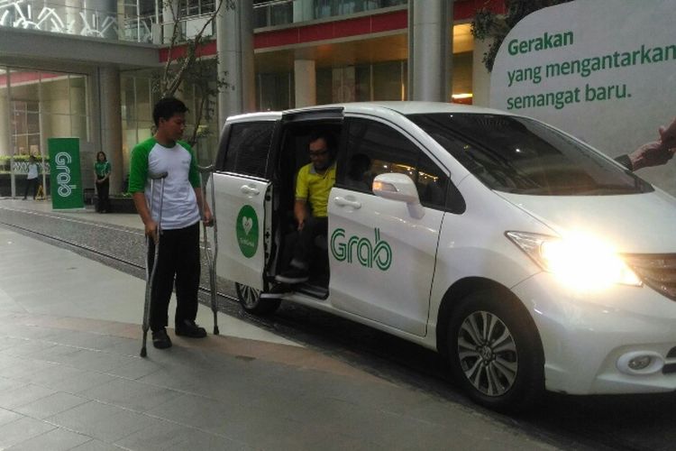 Salah satu mobil yang digunakan untuk layanan GrabGerak. Foto diambil Rabu (25/4/2018).