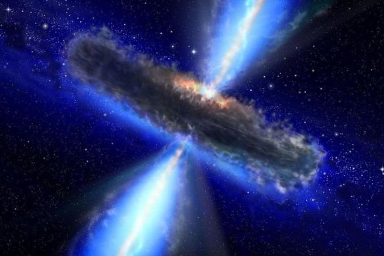 Ilustrasi seorang seniman menggambarkan lubang hitam quasar, atau supermasif, ultra-bercahaya.
