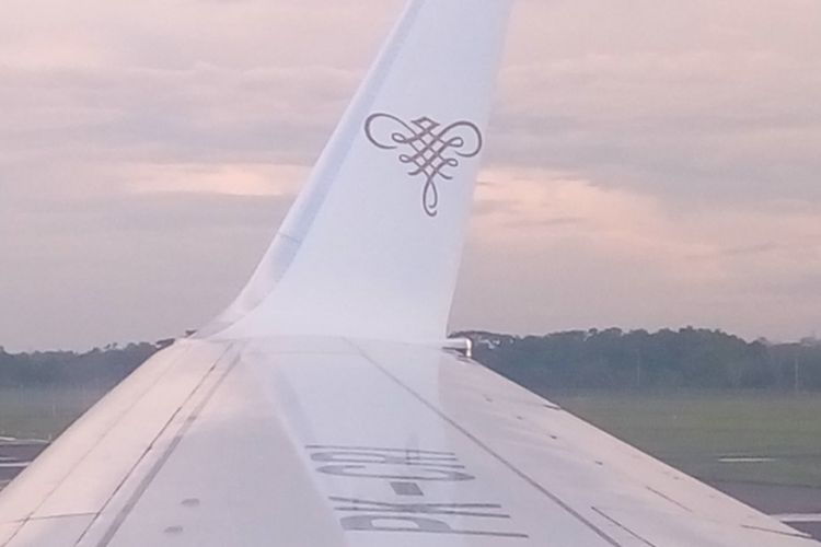 Logo Sriwijaya Air di sayap pesawat| Kompas.com