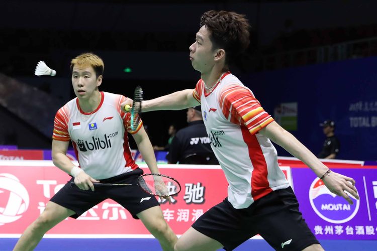 Marcus Fernaldi Gideon/Kevin Sanjaya Sukamuljo saat melawan pasangan Inggris Marcus Ellis/Chris Langridge di babak penyisihan grup Piala Sudirman 2019, Minggu (19/5/2019). 