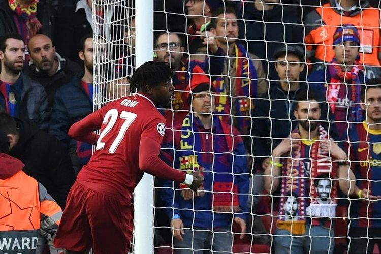 Divock Origi merayakan golnya pada pertandingan Liverpool vs Barcelona dalam semifinal Liga Champions di Stadion Anfield, 7 Mei 2019. 