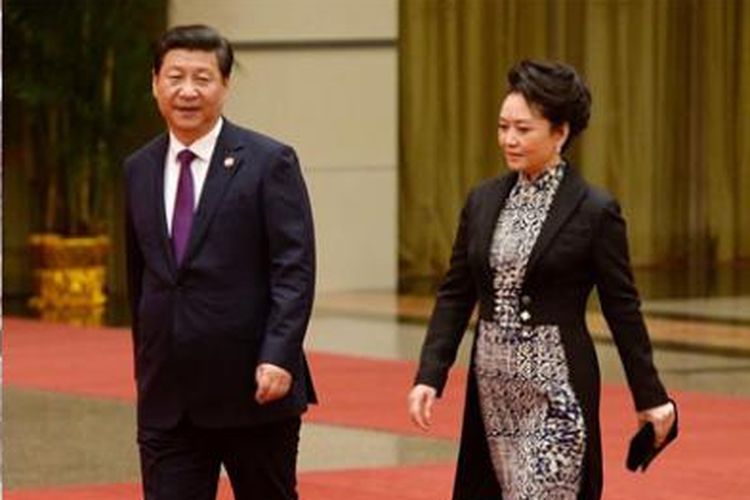 Peng Liyuan dan Presiden Republik Rakyat Tiongkok, Xi Jinping.