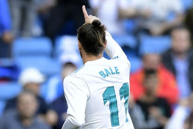 Pemain Real Madrid, Gareth Bale, merayakan golnya ke gawang Leganes pada laga pekan ke-35 Liga Spanyol di Stadion Santiago Bernabeu, Madrid, Spanyol, Sabtu (28/4/2018)