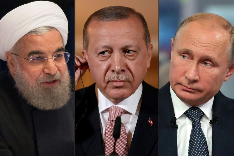 Dari kiri ke kanan. Presiden Iran Hassan Rouhani, Presiden Turki Recep Tayyip Erdogan, dan Presiden Rusia Vladimir Putin.