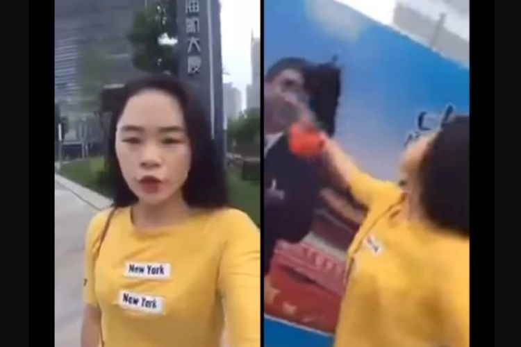 Hasil tangkapan layar rekaman video seorang perempuan yang menyiramkan tinta ke poster bergambar wajah Presiden China Xi Jinping.
