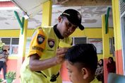 Ingin Dekat dengan Masyarakat, Polisi Ini Sediakan Cukur Rambut Gratis