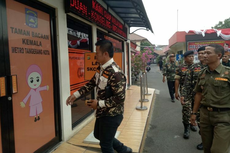 Anggota GP Ansor yang mendatangi Polres Tangerang pada Selasa (27/8/2019). untuk melapor terkait penyebaran video viral yang menyebutkan anggotanya ditindak TNI karena penyalahgunaan atribut. 