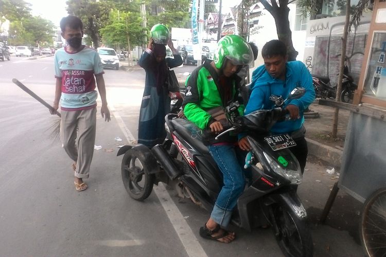 Andika Arisman kini menjadi pengendara ojek oline di Makassar