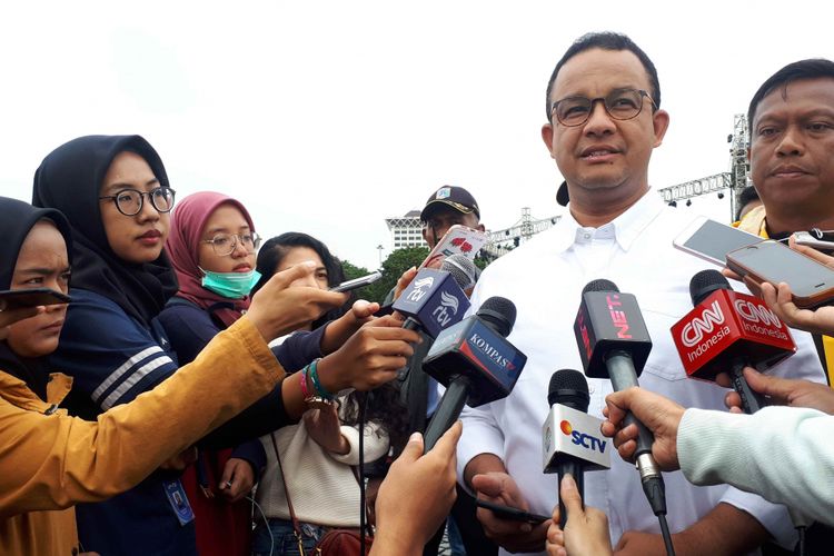 Gubernur DKI Jakarta Anies Baswedan di kawasan Monas, Selasa (1/1/2018).