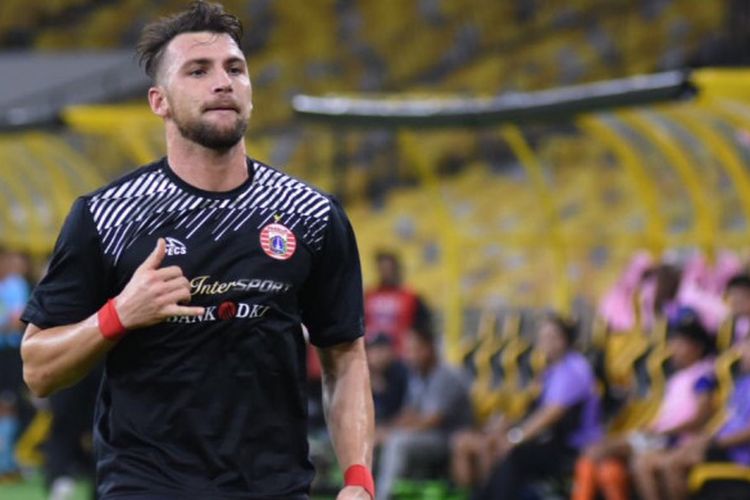 Selebrasi striker Persija, Marko Simic, seusai mencetak gol ke gawang Ratchaburi FC pada laga perdana turnamen pramusim Boost SportsFix Super Cup 2018 di Stadion Nasional Malaysia, Kuala Lumpur, Sabtu (13/1/2018) malam.