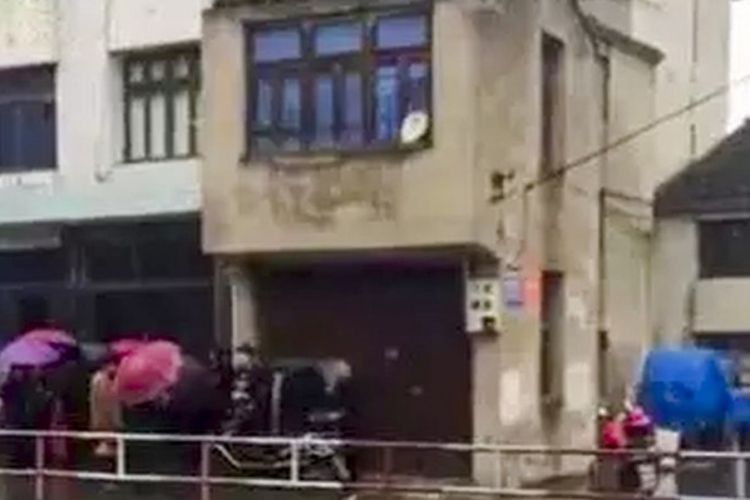 Gedung berlantai tiga di Ruian, Zhejiang, China, tempat ditemukannya mayat di atas kamar mandi yang diduga telah tewas sejak dua tahun lalu.