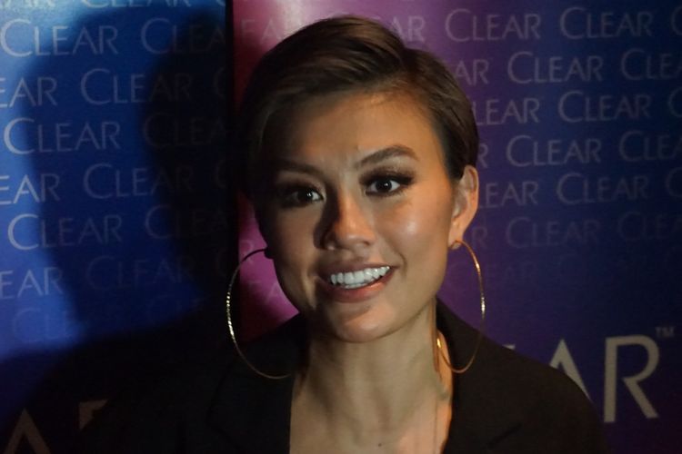 Agnez Mo hadir dalam private party salah satu produk perawatan rambut di SCBD, Senayan, Jakarta Selatan, Jumat (21/9/2018) malam.