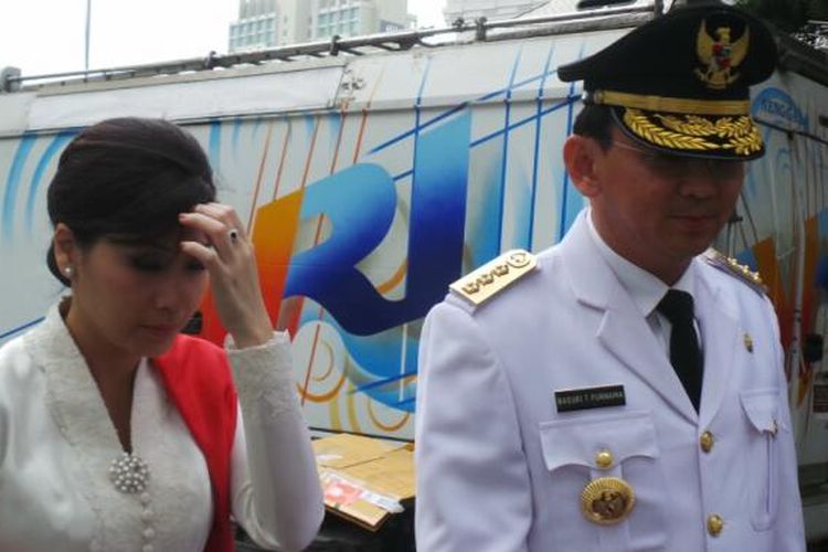 Basuki Tjahaja Purnama dan istrinya Veronica Tan di Istana Negara, Rabu (19/11/2014).