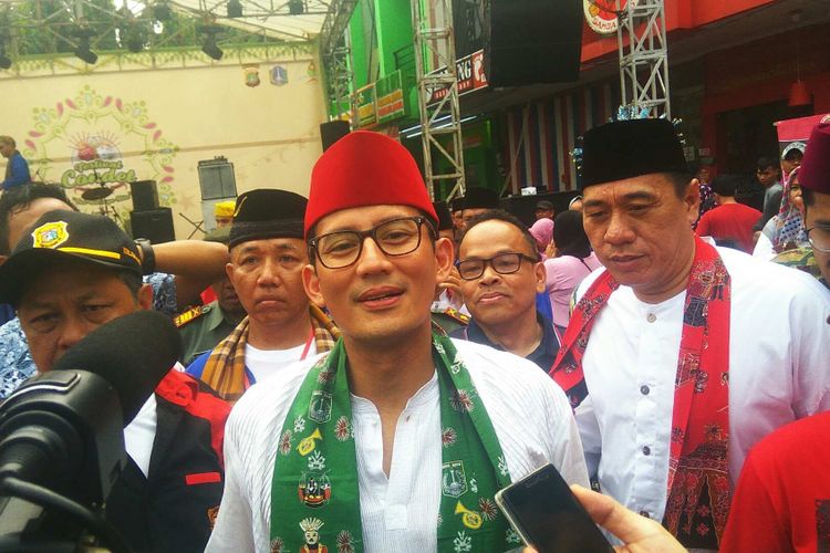 Wakil gubernur terpilih DKI Jakarta Sandiaga Uno menghadiri pembukaan Festival Condet, Sabtu (29/7/2017). 