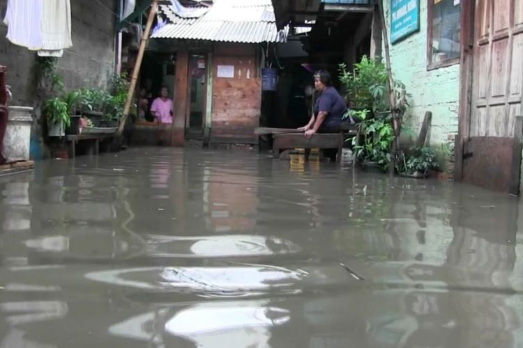 Banjir yang merendam pemukiman warga di RT 016 RW 005 Rawa Terate, Cakung,Rabu (30/1/2019)