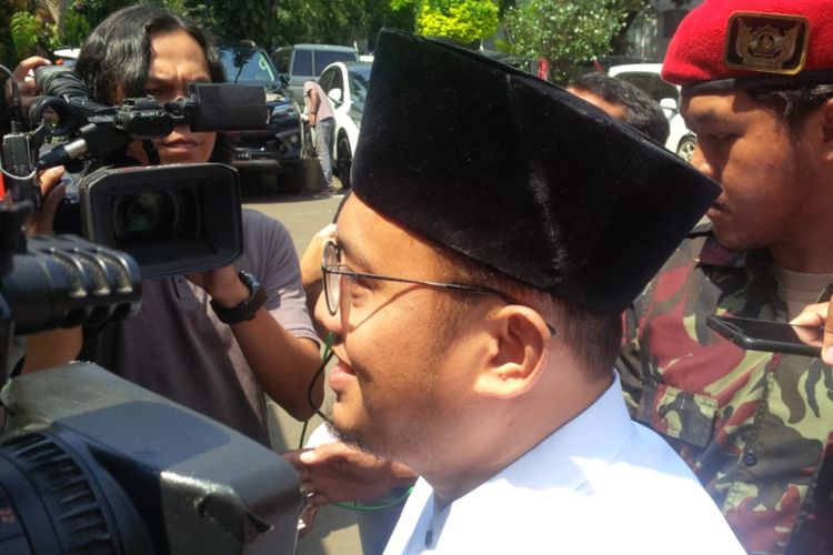 Ketua Umum PP Pemuda Muhammadiyah Dahnil Anzar Simanjuntak memenuhi panggilan Polda Metro Jaya terkait kasus dugaan korupsi kegiatan kegiatan kemah pemuda Islam Indonesia 2017, Jumat (23/11/2018).