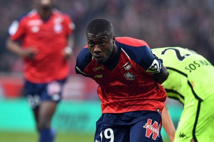 Pemain depan Lille asal Pantai Gading Nicolas Pepe berselebrasi setelah mencetak gol dalam pertandingan Ligue 1 Perancis antara Lille (LOSC) dan Angers (SCO) di Stadion Pierre-Mauroy di Villeneuve dAscq, dekat Lille, Prancis utara, pada 18 Mei 2019.