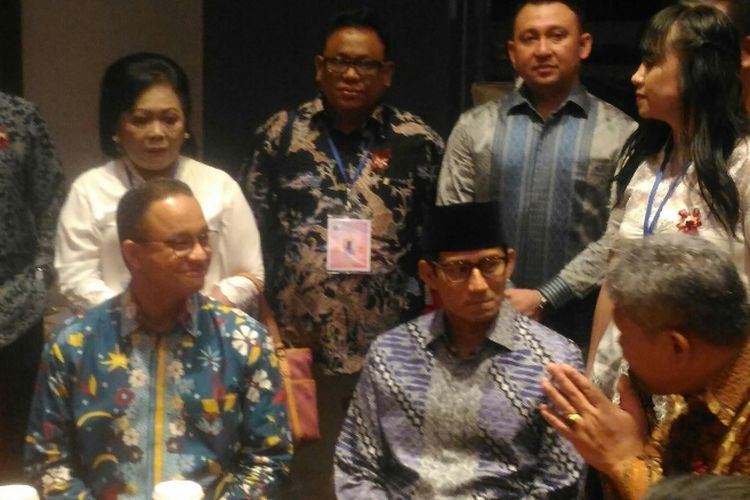 Gubernur dan Wakil Gubernur DKI Jakarta Anies Baswedan-Sandiaga Uno menghadiri perayaan Natal Bersama di Hall b3 JIExpo Kemayoran, Jakarta Pusat, Sabtu (13/1/2018).