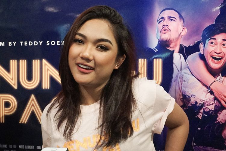 Penyanyi Marion Jola dalam jumpa pers peluncuran poster dan trailer film Menunggu Pagi di Qubicle Senopati, Kebayoran Baru, Jakarta Selatan, Selasa (14/8/2018).