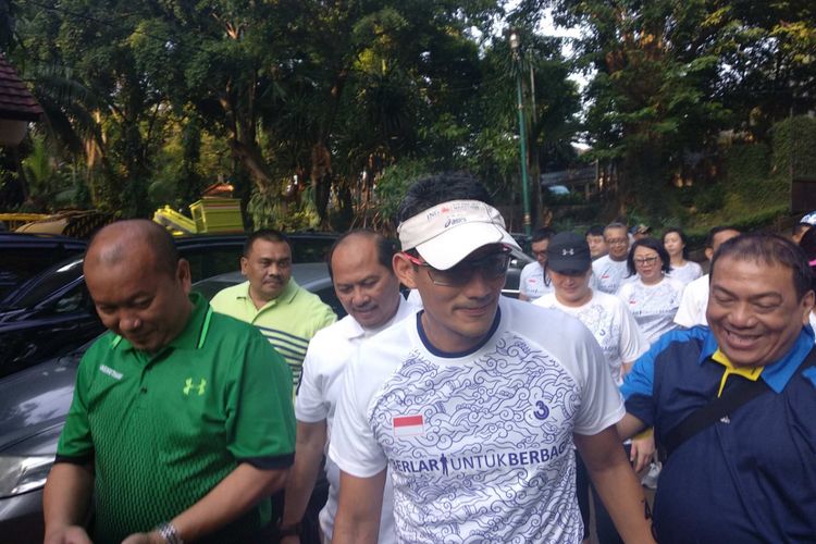 Wakil Gubernur DKI Jakarta Sandiaga Uno lari di Taman Langsat, Kebayoran Baru, Selasa (8/5/2018).