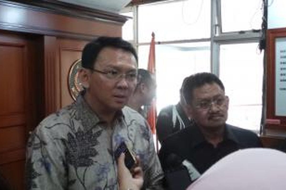 Wakil Gubernur DKI Jakarta Basuki Tjahaja Purnama bersama Kepala Kejati DKI Adi Togarisman.