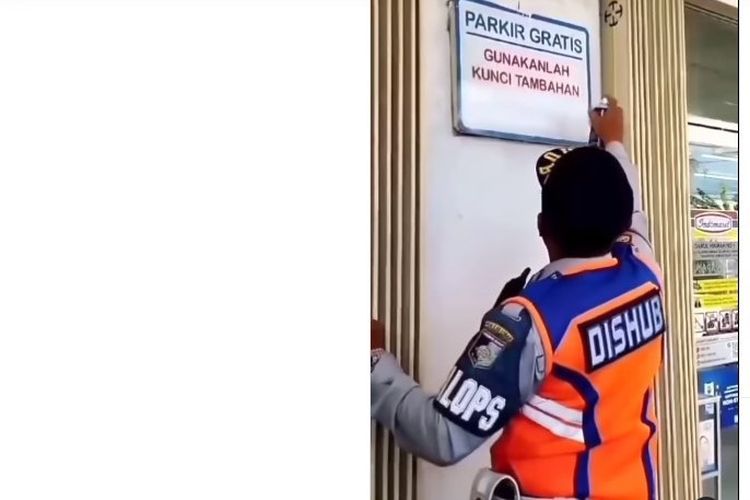 Tangkapan layar video yang menampilkan petugas Dishub Lombok Barat menghapus tulisan parkir gratis di minimarket