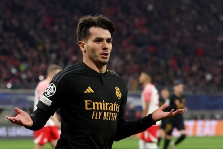 Gelandang Real Madrid, Brahim Diaz, merayaka golnya seusai membobol gawang RB Leipzig pada pertandingan leg pertama babak 16 besar Liga Champions di Red Bull Arena pada Selasa (13/2/2024) atau Rabu dini hari WIB.