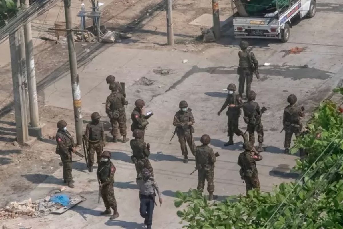 Members of the military in Myanmar stand guard at one the areas in the country. 