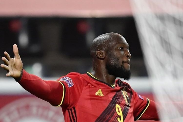 Striker Timnas Belgia, Romelu Lukaku, saat merayakan gol ke gawang Denmark pada laga yang berlangsung di Stadion King Power, Leuven, Kamis (19/11/2020) dini hari WIB.