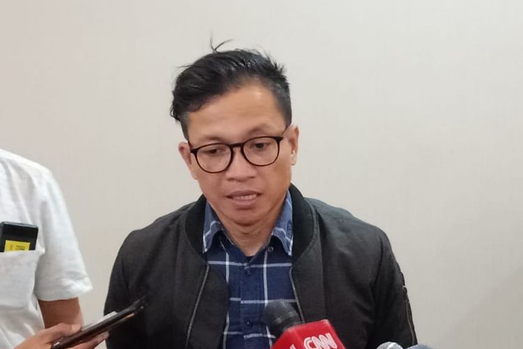 Direktur Eksekutif Amnesty International Indonesia Usman Hamid di Gedung Bareskrim Mabes Polri, Jakarta Selatan, Senin (8/7/2019).