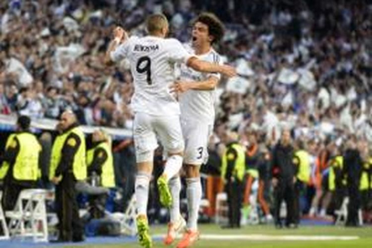 Dua pemain Real Madrid, Karim Benzema (kiri) dan Pepe (kanan).