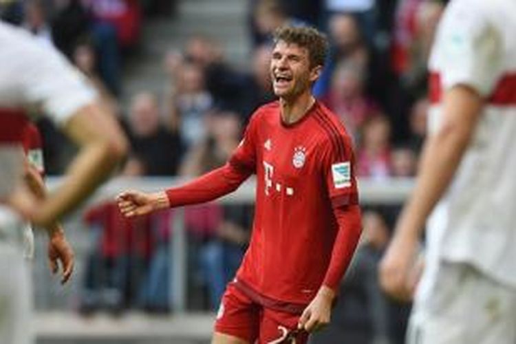 Thomas Mueller bukukan rekor saat Bayern menang 4-0 atas Stuttgart, Sabtu (7/11/2015). 
