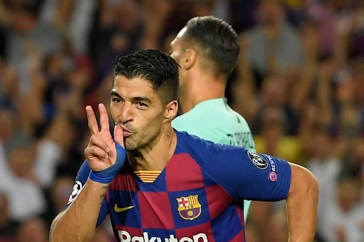 Luis Suarez merayakan golnya pada pertandingan Barcelona vs Inter Milan dalam lanjutan Liga Champions di Stadion Camp Nou, 2 Oktober 2019.