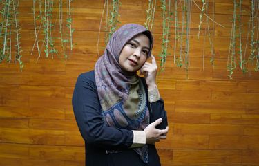 Tantri Syalindri Ichlasari yang lebih dikenal sebagai vokalis Kotak 