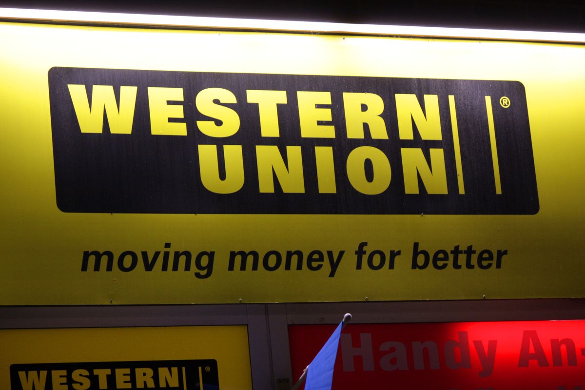 Ilustrasi cara mengambil uang di Western Union.