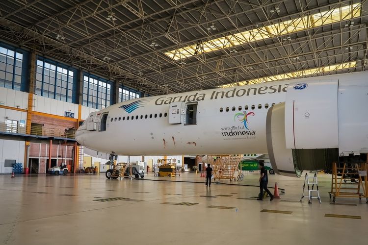 Ilustrasi hanggar perawatan dan perbaikan pesawat milik PT GMF Aero Asia Tbk di Bandara Internasional Soekarno-Hatta, Tangerang, Banten.