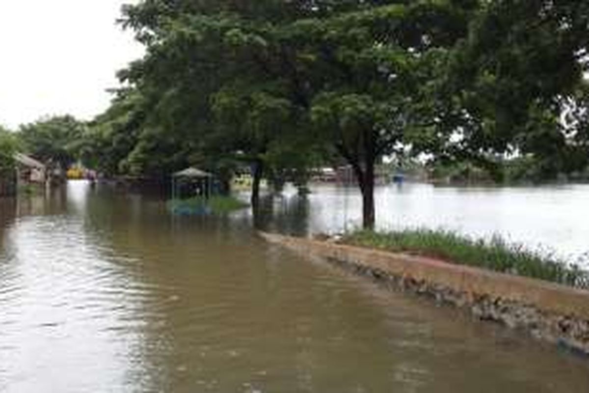 Banjir di daerah Rawa Bulakan, Kota Tangerang, Selasa (1/3/2016).